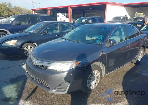 2013 Toyota Camry Le z USA, uszkodzony, nr VIN 4T1BF1FK7DU649889